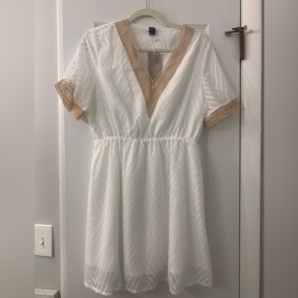 White lined dress or cover up with gold accents